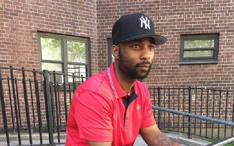 Late morning on 125th, a boy on a bike goes down